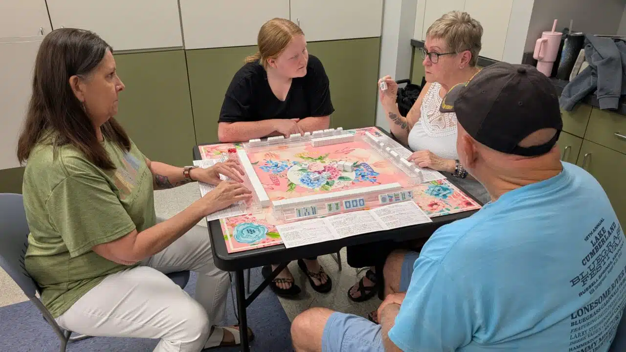 mahjong aficionados playing mahjong